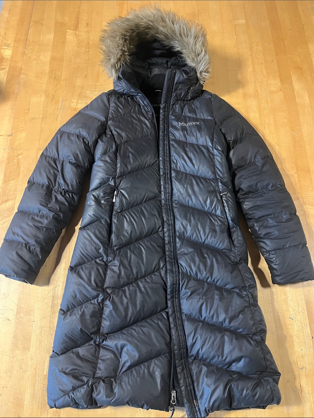 Marmot Women's Montreaux Black Long Puffer Coat with Faux Fur Trimmed Hood